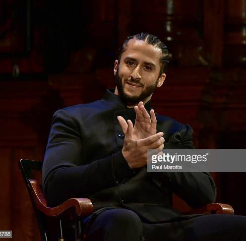 CAMBRIDGE, MA - OCTOBER 11: Colin Kaepernick on stage at the W.E.B. Du Bois Medal Award Ceremony at Harvard University on October 11, 2018 in Cambridge, Massachusetts. 2018 Honorees included Kehinde Wiley, Florence Ladd, Kenneth Chenault, Shirley Ann Jackson, Pamela Joyner, Bryan Stevenson, Dave Chappelle and Colin Kaepernick. (Photo by Paul Marotta/Getty Images)